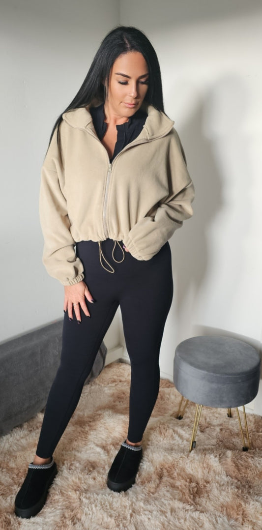 "Cream of the crop" cropped fleece jacket.